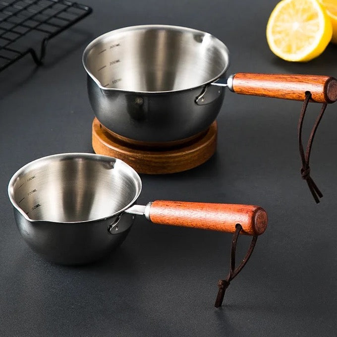Stainless steel cook pot with wooden handle