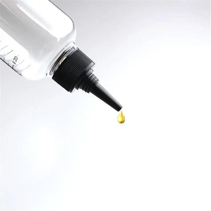 Nozzle tip pouring a drop